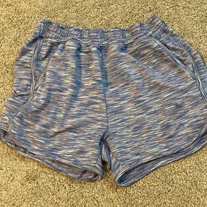 runway purple, blue, and white shorts